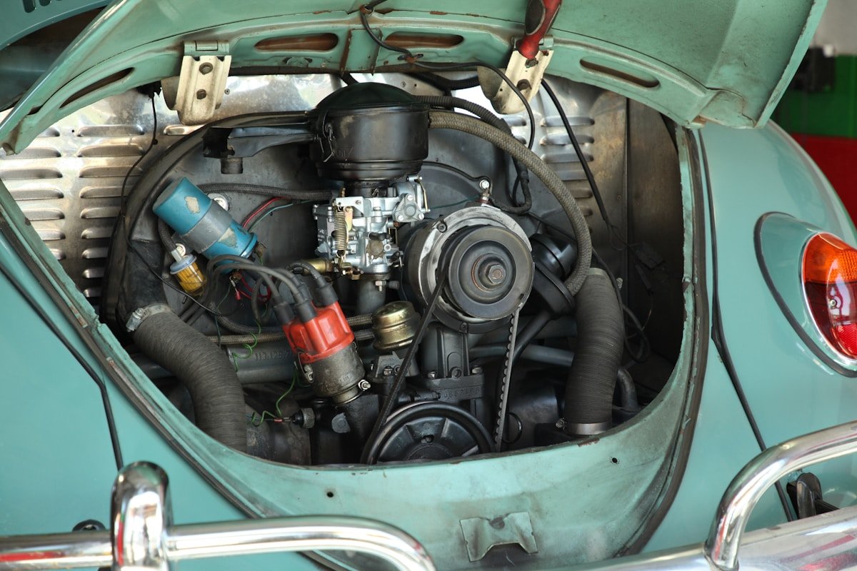 green and black car engine bay