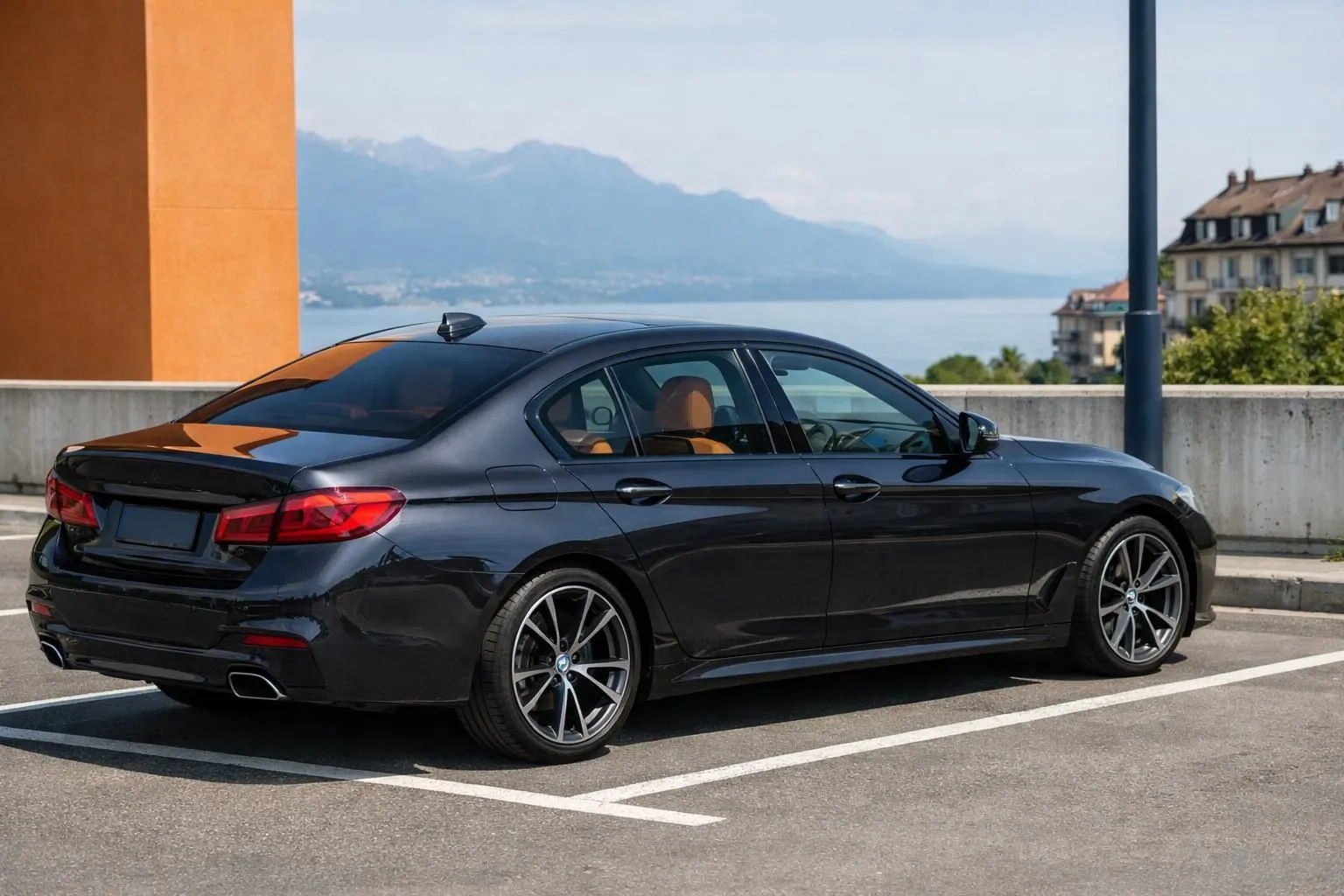Close-up of luxury sedan with ceramic window tinting reflecting sunlight in Lausanne parking area, showing heat rejection with visible dashboard interior through tinted glass, Swiss license plate visible, no text or labels