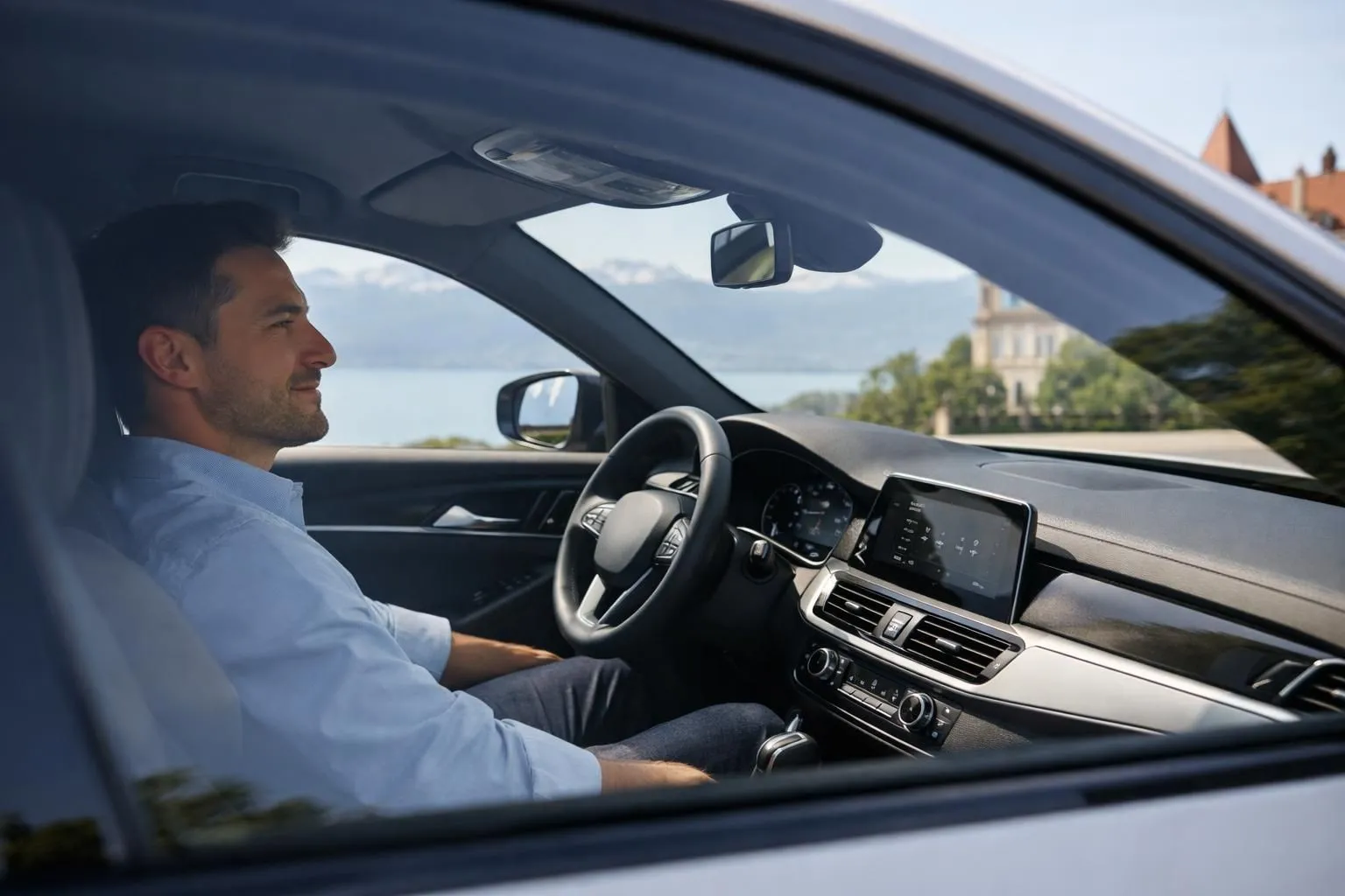 Car driver comfortably seated behind tinted window on sunny day, interior dashboard visible with no glare, professional automotive setting showing heat rejection benefit, modern vehicle in Lausanne Switzerland, no text or labels