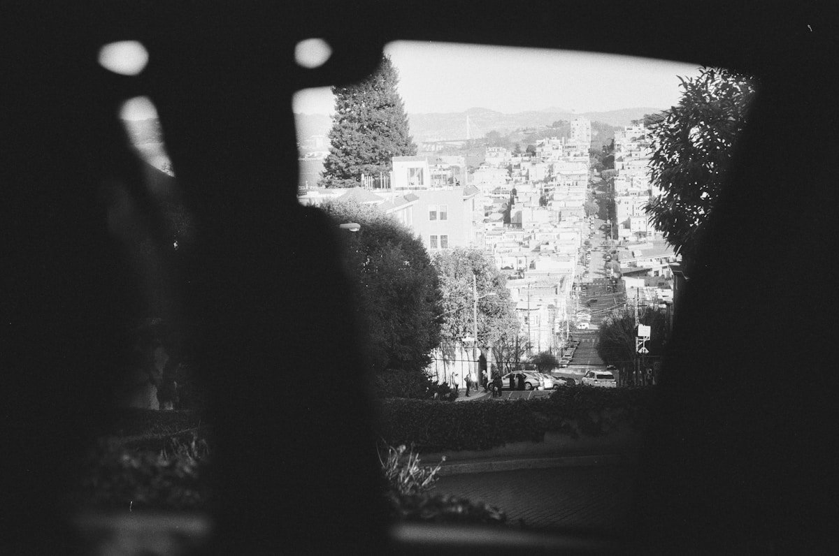 grayscale photo of city buildings