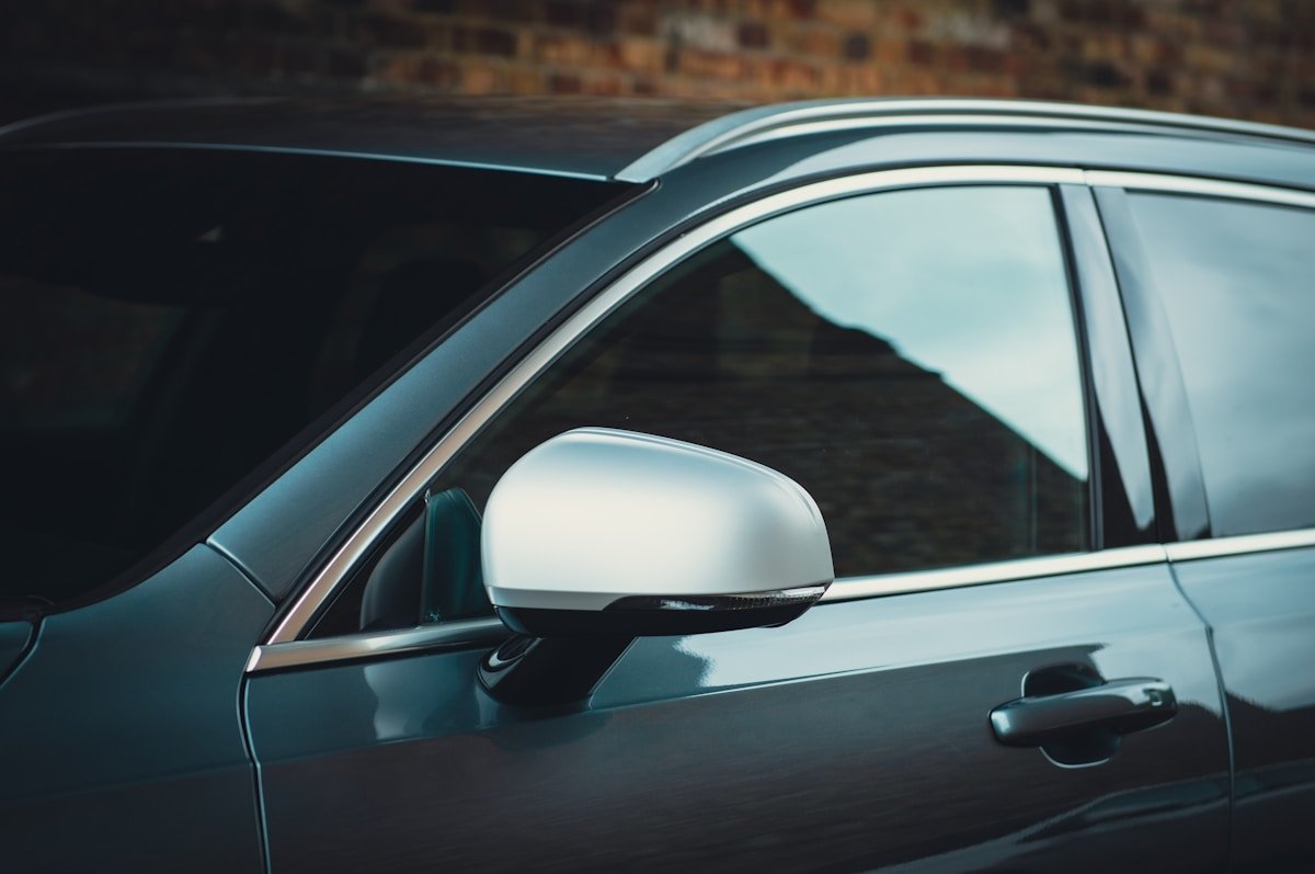gray car with open door